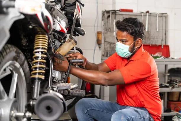 Motorcycle roadside support for two-wheeler members